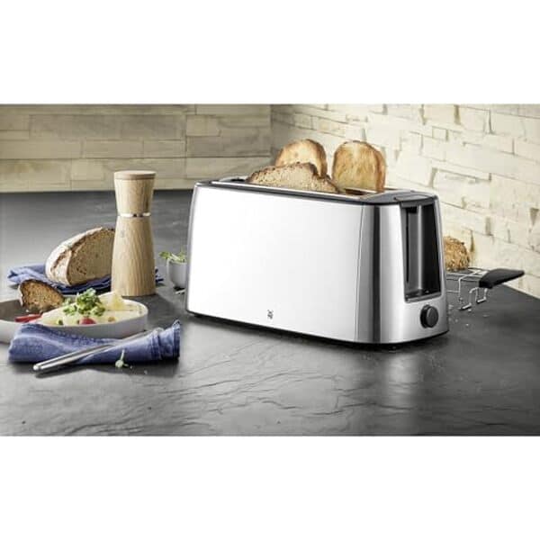 Découvrez notre test approfondi du grille-pain WMF Bueno Pro XXL : puissance de 1550 W pour des toasts parfaits, efficacité garantie pour votre petit-déjeuner  !